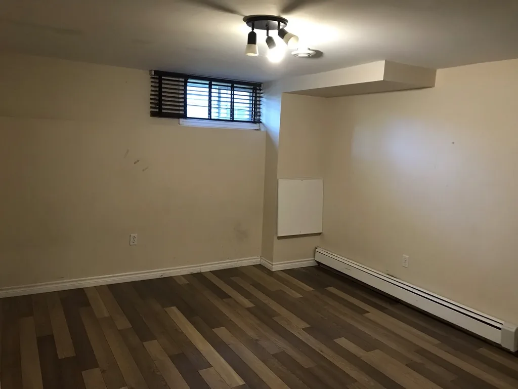Donaldson Avenue — Basement Bed, before the renovation by MAD Design Interiors