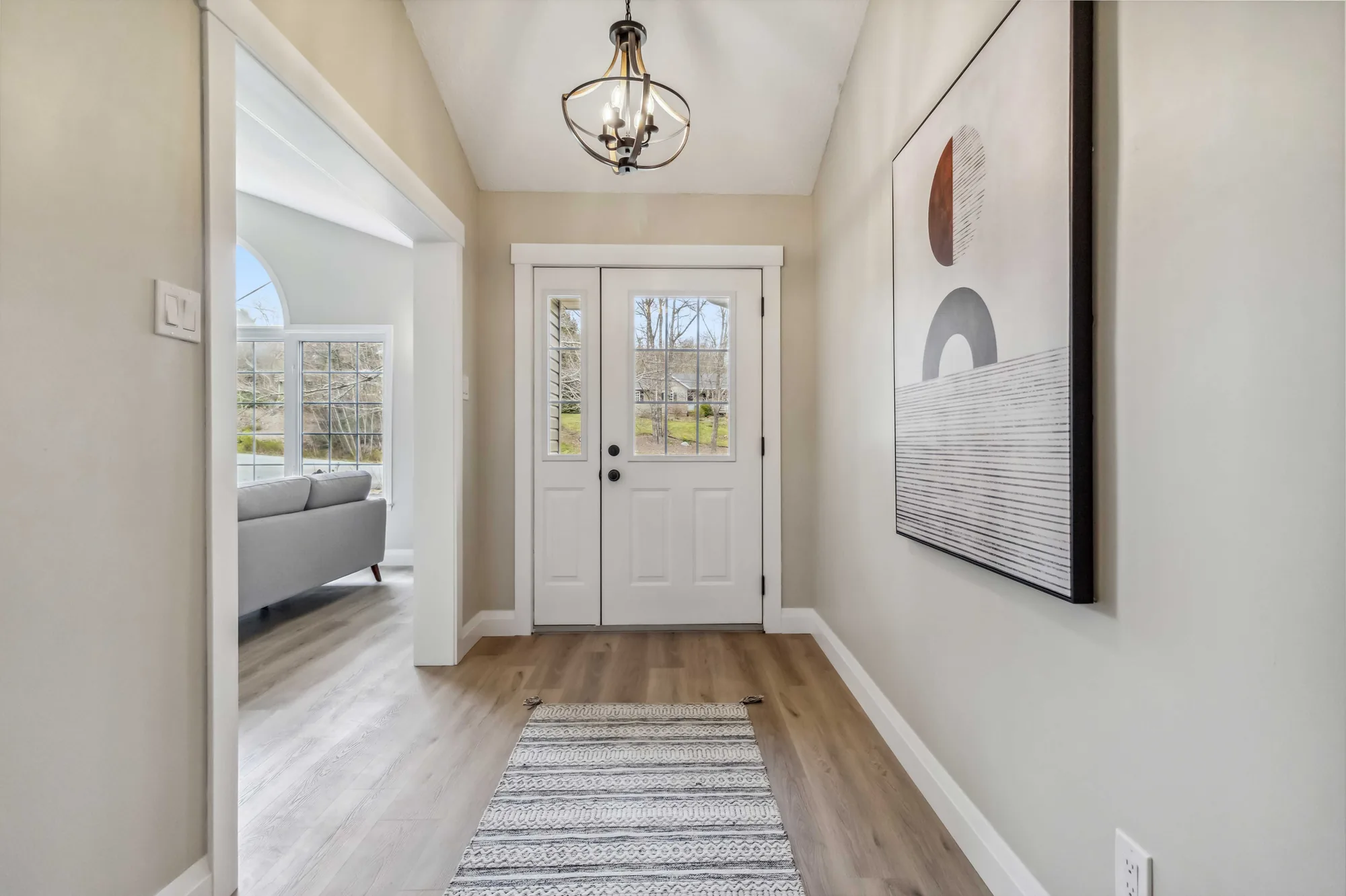 Gail Avenue — Foyer, after the renovation by MAD Design Interiors